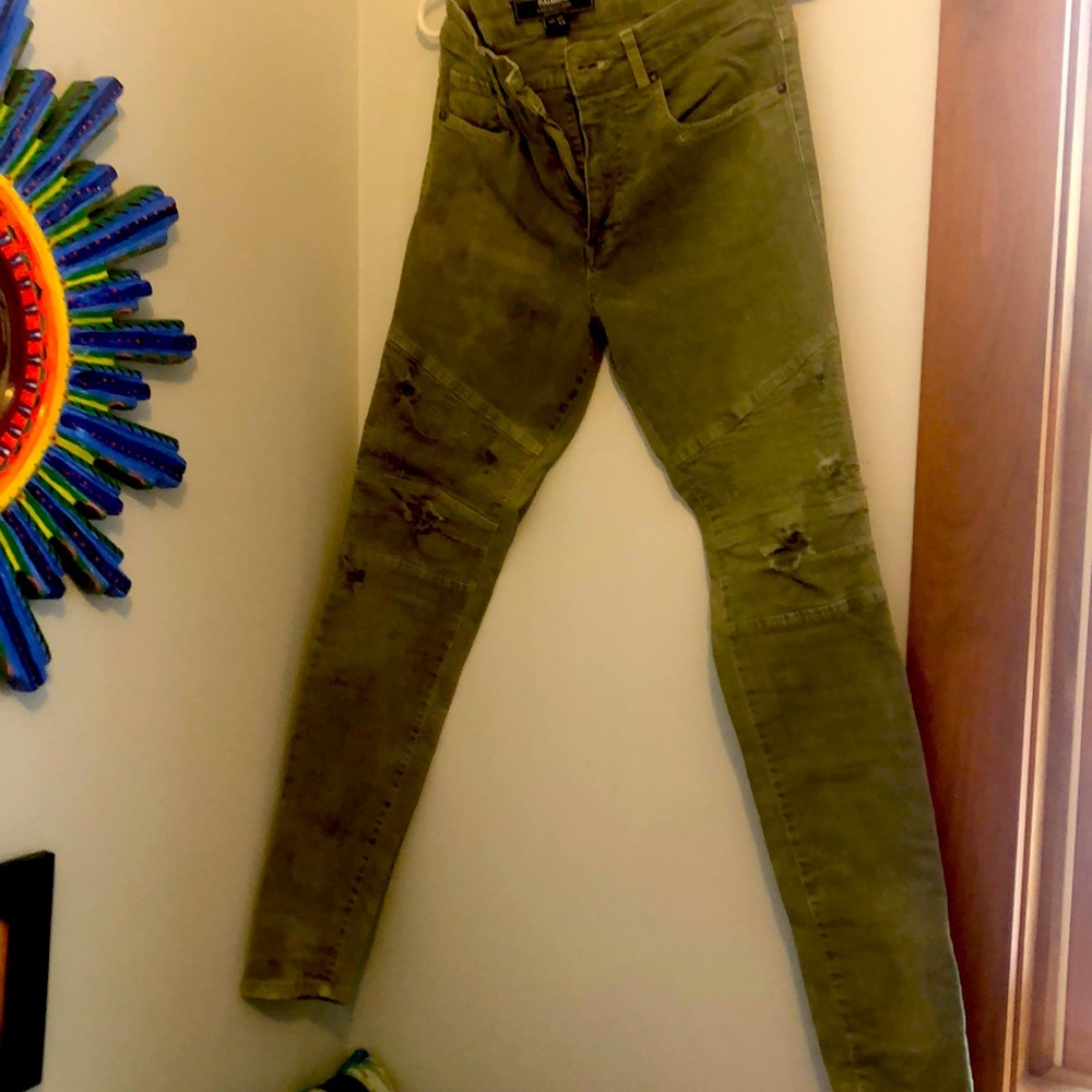 Sage green distressed moto jeans